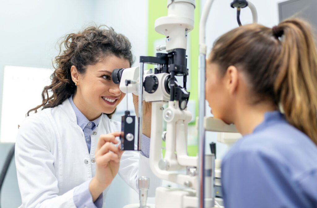 A person getting their vision checked by an optometrist.